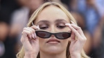 Lily-Rose Depp poses for photographers at the photo call for the television series "The Idol" at the 76th international television series festival, Cannes, southern France, Tuesday, May 23, 2023. (Photo by Vianney Le Caer/Invision/AP)