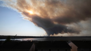 Thick plumes of heavy smoke fill the Halifax sky as an out-of-control fire in a suburban community quickly spread, engulfing multiple homes and forcing the evacuation of local residents on Sunday May 28, 2023. THE CANADIAN PRESS/Kelly Clark