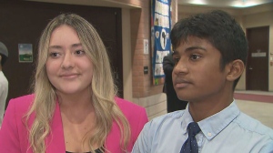 Student trustees Anthea Peta-Dragos, left, and Jonah James react after their motion to fly the Pride flag in June outside YCDSB's  Catholic Education Centre in Aurora was defeated.