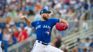 Toronto Blue Jays' Anthony Bass delivers a pitch during a spring training game against the New York Yankees at TD Ballpark in Dunedin, Fla., Saturday, March 18, 2023. THE CANADIAN PRESS/Mark Taylor