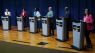 Josh Matlow (left) applauds a comment from Mitzie Hunter (centre left) as they are joined on stage by Olivia Chow (second left) Brad Bradford (centre right) Mark Saunders (second right) and Ana Bailao (right) at a Toronto Mayoral Candidates debate in Scarborough, Ont. on Wednesday, May 24, 2023. Six of the leading candidates to be Toronto's next mayor will face off tonight in a debate over what organizers call the critical social and economic challenges facing the city. THE CANADIAN PRESS/Chris Young