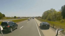 Speeding on Highway 401 shoulder