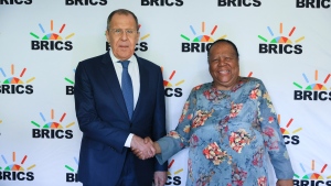 In this handout photo released by Russian Foreign Ministry Press Service, Russian Foreign Minister Sergey Lavrov, left, and South Africa's Minister of International Relations and Cooperation Naledi Pandor shake hands during their meeting on the sideline of a BRICS Foreign Ministers meeting in Cape Town, South Africa, Thursday, June 1, 2023. (Russian Foreign Ministry Press Service via AP)