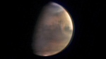 This image provided by the European Space Agency and taken with the ESA's High Resolution Stereo Camera (HRSC) aboard the Mars Express spacecraft shows Mars as the spacecraft approaches the planet from a distance of 5.5 million kilometers. Launched in 2003, the spacecraft marked it's 20th anniversary, Friday, June 2, 2023. (European Space Agency via AP)