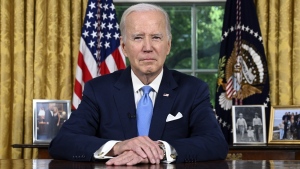 President Joe Biden pauses before addresses the nation on the budget deal that lifts the federal debt limit and averts a U.S. government default, from the Oval Office of the White House in Washington, Friday, June 2, 2023. (Jim Watson/Pool via AP)