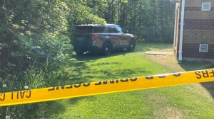 A photo of police tape on Matthew Way in Collingwood, where police are investigating a homicide, taken on Sat., June 3 (Christopher Garry/CTV News). 