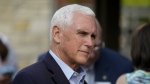 Former Vice President Mike Pence talks with local residents during a meet and greet on May 23, 2023, in Des Moines, Iowa. Pence will officially launch his widely expected campaign for the Republican nomination for president in Iowa on June 7. (AP Photo/Charlie Neibergall)