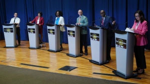 Toronto mayoral candidates Josh Matlow, left to right, Olivia Chow, Mitzie Hunter, Brad Bradford, Mark Saunders and Ana Bailao take the stage at a mayoral debate in Scarborough, Ont. on Wednesday, May 24, 2023. The six leading candidates in Toronto's mayoral race are set to have another debate this morning, just days before advance voting opens on Thursday. THE CANADIAN PRESS/Chris Young