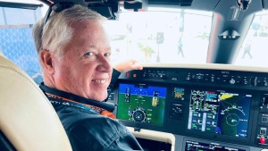 In this undated photo provided by family, pilot Jeff Hefner smiles from the cockpit of a small aircraft. Hefter, pilot of the business jet that flew over Washington and crashed in Virginia Sunday, June 4, 2023, appeared to be slumped over and unresponsive, the fighter jet pilots reported, according to three U.S. officials briefed on the matter. (AP Photo)