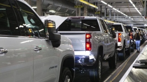 General Motors says it's investing $280 million in its Oshawa assembly plant to produce its next generation of full-sized internal combustion engine pickup trucks. Chevrolet Silverados sit on the General Assembly line at the GM plant in Oshawa, Ontario, on Tuesday, February 22 2022. THE CANADIAN PRESS/Chris Young