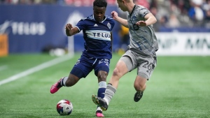 Vancouver Whitecaps' Javain Brown, left, tries to move the ball past CF Montreal's Robert Thorkelsson during the second half of an MLS soccer game in Vancouver, on Saturday, April 1, 2023. The Vancouver Whitecaps say they cannot underestimate CF Montreal, their Canadian Championship opponents, heading in to Wednesday night's cup final match. THE CANADIAN PRESS/Darryl Dyck
