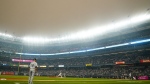 New York Yankees' Clarke Schmidt pitches to Chicago White Sox's Tim Anderson during the first inning of a baseball game Tuesday, June 6, 2023, in New York. Smoke from Canadian wildfires has traveled into the United States, resulting in a number of air quality alerts issued since May. (AP Photo/Frank Franklin II)