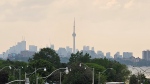 The Toronto skyline is shown shrouded in smoke on Thursday morning. (CP24/Chris Broadley)