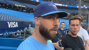 Toronto Blue Jays relief pitcher Anthony Bass speaks to gives a statement to media ahead of interleague baseball action against the Milwaukee Brewers in Toronto on Tuesday, May 30, 2023. THE CANADIAN PRESS/John Chidley-Hill