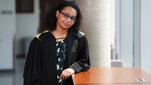 Anthaea-Grace Patricia Dennis poses for a portrait at the University of Ottawa in Ottawa on Friday, June 2, 2023. The 12-year-old is graduating from the University of Ottawa's biomedical science program, and setting a record in the process. THE CANADIAN PRESS/Sean Kilpatrick