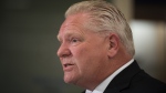 FILE - Ontario Premier Doug Ford answers questions following a press conference at a Shoppers Drug Mart pharmacy in Etobicoke, Ont., on Wednesday, January 11, 2023. THE CANADIAN PRESS/ Tijana Martin 