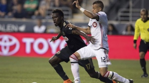 Philadelphia Union's C.J. Sapong, left, works for the ball against Toronto FC's Jason Hernandez, right, during the first half of an MLS soccer match, in Chester, Pa., Friday, June 8, 2018. Toronto FC announced on Tuesday that assistant general manager Jason Hernandez has been promoted to general manager. THE CANADIAN PRESS/AP-Chris Szagola
