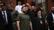 Ukrainian President Volodymyr Zelenskyy, center left, stands next to Ecumenical Patriarch Bartholomew I, the spiritual leader of the world's Orthodox Christians, at the Patriarchal Church of St. George in Istanbul, Turkey, Saturday, July 8, 2023. Zelenskyy attended a memorial ceremony for the victims of the war in Ukraine led by Patriarch Bartholomew I. (AP Photo/Francisco Seco)