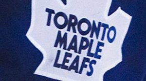 The Toronto Maple Leafs have hired Derek Clancey as assistant general manager, player personnel. The Toronto Maple Leafs logo is seen on goalie Jonas Gustavsson's jersey in a Monday, November 22, 2010 photo. THE CANADIAN PRESS/Nathan Denette