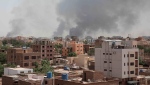Smoke is seen rising from Khartoum's skyline, Sudan, Sunday, April 16, 2023. (AP Photo/Marwan Ali)