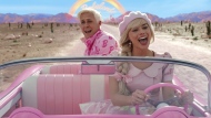This image released by Warner Bros. Pictures shows Ryan Gosling, left, and Margot Robbie in a scene from "Barbie." Cineplex Inc. says it saw its highest July box office of all time as "Barbie" and "Oppenheimer" sent droves to theatres last month. THE CANADIAN PRESS/AP-Warner Bros. Pictures via AP

