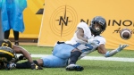 Toronto Argonauts wide receiver Markeith Ambles (17) tries to catch a pass in the end zone while defended bye Hamilton Tiger Cats defensive back Richard Leonard (23) during second half CFL football game action in Hamilton, Ont. on Monday, September 5, 2022. The Toronto Argonauts released veteran American receiver Markeith Ambles. THE CANADIAN PRESS/Peter Power