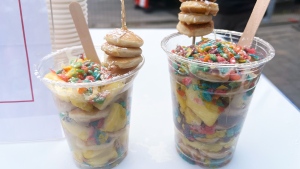 New to the CNE for 2023, visitors can treat themselves with 20 mini pancakes loaded with pineapple, condensed milk and Fruity Pebbles. More than 100 vendors are hoping to entice attendees with one of their unique edible creations that can only be found at the CNE. (CP24/Aisling Murphy)