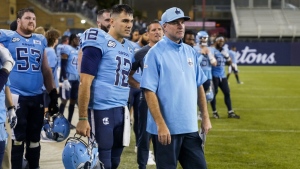 It's going to be a busy second half of the CFL regular season for Chad Kelly and the Toronto Argonauts. Kelly (12) and head coach Ryan Dinwiddie look on during second half CFL football action against the Ottawa Redblacks in Toronto, Sunday, Aug. 13, 2023. THE CANADIAN PRESS/Andrew Lahodynskyj