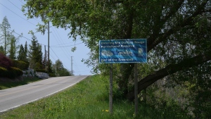 A sign marks an entry point into the Duffins Rouge Agricultural Preserve, part of Ontario's Greenbelt , on Monday, May 15, 2023, THE CANADIAN PRESS/Chris Young