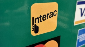 The Interac logo is shown in Toronto on Wednesday, Aug. 23, 2023. THE CANADIAN PRESS/Joe O'Connal