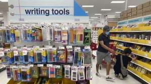 A new survey by PC Financial found 46 per cent of Canadians are more worried about their finances for this back-to-school season than in previous years. Shoppers look for school supplies deals at a Target store, in South Miami, Fla., Wednesday, July 27, 2022. THE CANADIAN PRESS/AP-Marta Lavandier