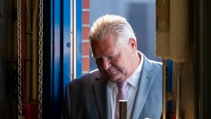 Ontario Premier Doug Ford arrives to a press conference at Lakeshore Collegiate Institute in Toronto, Thursday, Aug. 31, 2023. THE CANADIAN PRESS/Spencer Colby