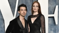 Joe Jonas, left, and Sophie Turner appear at the Vanity Fair Oscar Party on March 12, 2023, at the Wallis Annenberg Center in Beverly Hills, Calif. Jonas has filed for divorce from Turner after four years of marriage and two children. The 34-year-old Jonas Brothers singer filed to end his marriage with the 27-year-old star of “Game of Thrones” and “X-Men” actor on Tuesday, Sept. 5, 2023, in a Florida court. (Photo by Evan Agostini/Invision/AP, File)