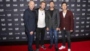 Nickelback band members, left to right, Michael Kroeger, Chad Kroeger, Daniel Adair and Ryan Peake pose for a photograph on the red carpet for the movie "Hate to Love: Nickelback” at the Toronto International Film Festival in Toronto, Friday, Sept. 8, 2023. THE CANADIAN PRESS/Andrew Lahodynskyj