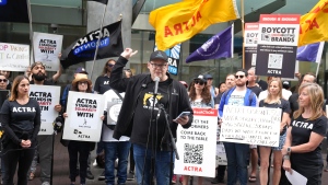 Duncan Crabtree-Ireland, the Screen Actors Guild - American Federation of Television and Radio Artists (SAG-AFTRA) Chief Negotiator, speaks , as he is joined by members of the Alliance of Canadian Cinema Television Radio Artists (ACTRA) as they unions hold a joint rally outside the Canadian headquarters of Amazon and Apple in Toronto, Saturday, Sept. 9, 2023, to protest corporate greed that is diminishing the livelihoods of their members. THE CANADIAN PRESS/Chris Young