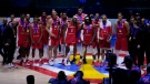 Canada players pose for a photo after the Basketball World Cup bronze medal game between the United States and Canada in Manila, Philippines, Sunday, Sept. 10, 2023. (AP Photo/Michael Conroy)