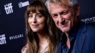 Dakota Johnson, left and Sean Penn attend the premiere of "Daddio" at the TIFF Bell Lightbox during the Toronto International Film Festival, Sunday, Sept. 10, 2023, in Toronto. (Photo by Joel C Ryan/Invision/AP)