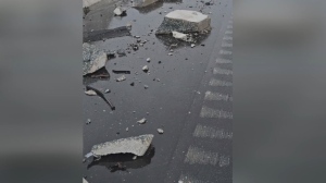 Concrete is shown on Highway 401 following a collision on Tuesday morning. (Ontario Provincial Police)