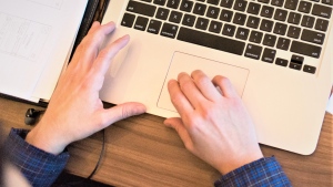 A man can be seen typing on a laptop in this undated filed photo. (Christina Morillo/Pexels)