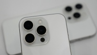 Camera lenses on the iPhone 15 Pro Max phone is shown during an announcement of new products on the Apple campus in Cupertino, Calif., Tuesday, Sept. 12, 2023. (AP Photo/Jeff Chiu)