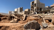 Flooding aftermath is seen in Derna, Libya, Thursday, Sept.14, 2023. Search teams are combing streets, wrecked buildings, and even the sea to look for bodies in Derna, where the collapse of two dams unleashed a massive flash flood that killed thousands of people. (AP Photo/Yousef Murad)