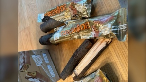 A Toronto actor says his package of protein bars was actually filled with small pieces of wood.
