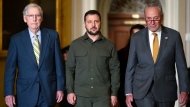 Ukrainian President Volodymyr Zelenskyy, center, walks with Senate Minority Leader Mitch McConnell of Ky., left, and Senate Majority Leader Chuck Schumer of N.Y., right, at Capitol Hill on Thursday, Sept. 21, 2023, in Washington. (AP Photo/Mark Schiefelbein)
