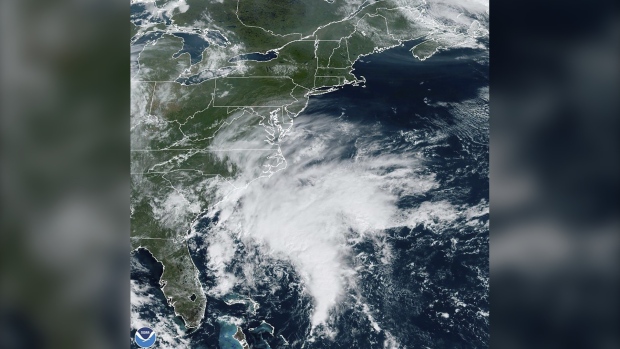 This Thursday, Sept. 21, 2023, satellite image provided by the National Oceanic and Atmospheric Administration shows a potential tropical cyclone forming off the southeastern coast of the United States in the Atlantic Ocean. (NOAA via AP)