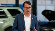 Minister of Labour, Immigration, Training and Skills Development, Monte McNaughton, delivers remarks at Lakeshore Collegiate Institute in Toronto, on Thursday, Aug. 31, 2023. THE CANADIAN PRESS/Spencer Colby