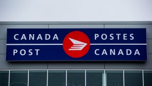 The Canada Post logo is seen on the outside the company's Pacific Processing Centre, in Richmond, B.C., on June 1, 2017. THE CANADIAN PRESS/Darryl Dyck
