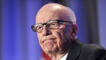 FILE - In this Oct. 14, 2011, file photo, News Corp. CEO Rupert Murdoch delivers a keynote address at the National Summit on Education Reform in San Francisco. Murdoch stirs mixed feelings in Britain, where he transformed the media over half a century. U.K. journalists and politicians are both hailing and reviling the 92-year-old mogul after he announced he was stepping down as leader of his media empire. (AP Photo/Noah Berger, File)
