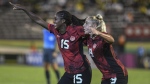 Canada's Nichelle Prince, left, celebrates her goal against Jamaica with her teammate Adriana Leon, during a CONCACAF women's championship soccer series match in Kingston, Jamaica, Friday, Sept. 22, 2023. (AP Photo/Collin Reid)