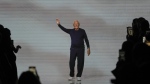 Designer Giorgio Armani accepts applause after the conclusion of his women's Spring Summer 2024 collection presented in Milan, Italy, Sunday, Sept. 24, 2023. (AP Photo/Luca Bruno)