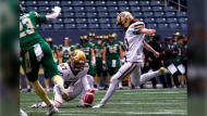 Manitoba Bisons kicker Maya Turner, shown in this handout image, makes a field goal during a regular-season U Sports football game against the University of Regina Rams in Winnipeg on Saturday Sept. 23, 2023. Turner hopes her historic accomplishment will inspire other women who dream of kicking down barriers to play men’s football at a high level. THE CANADIAN PRESS/HO-Zach Peters